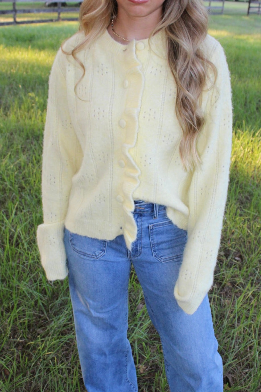 Yellow ruffle button sweater